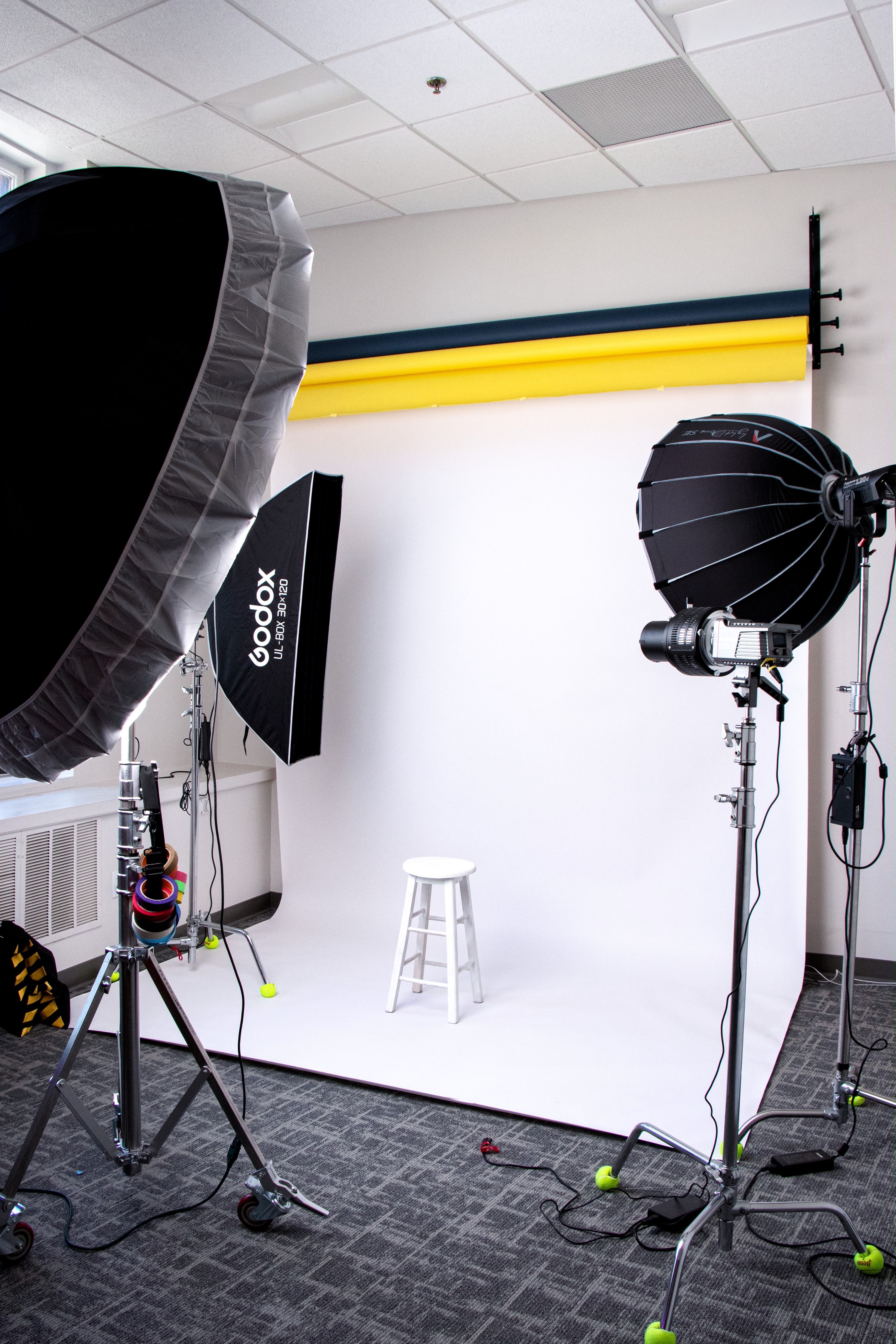 Empire Studio photography space with professional lighting and a seamless white backdrop